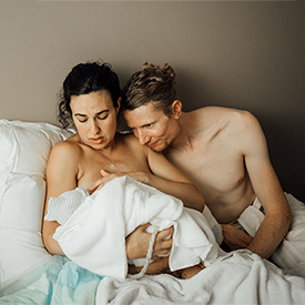 My hubby and I within an hour of our daughter being born.