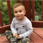Our son Kingsley enjoying a snack on our porch in Santa Barbara