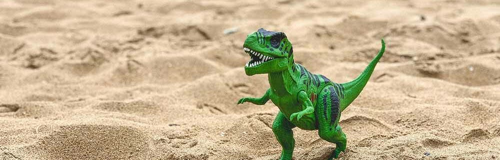 dinosaur in sand