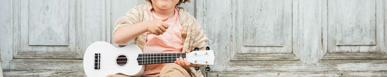 boy playing guitar
