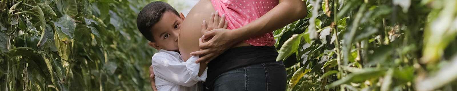 pregnant woman with child