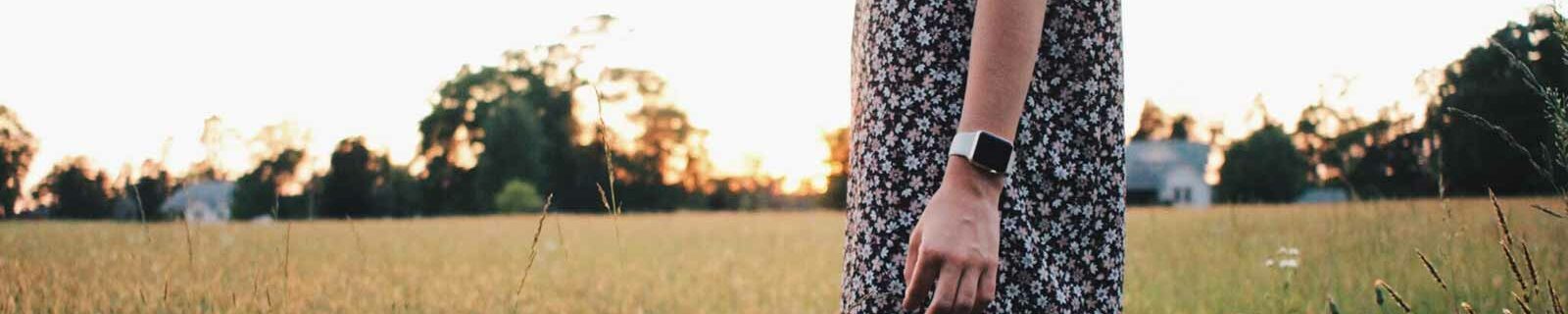 Lady wearing a smartwatch outdoors
