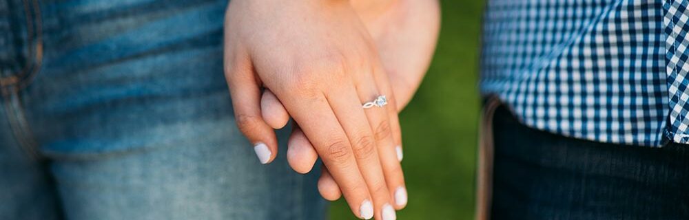 Engagement ring - Couple holding hand