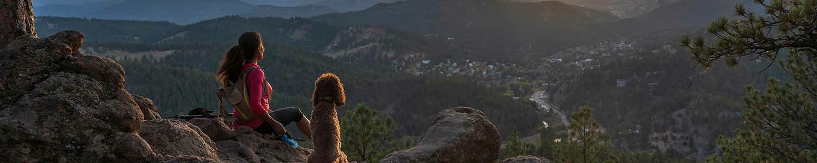 Watching sunset with dog-in-colorado in the mountains